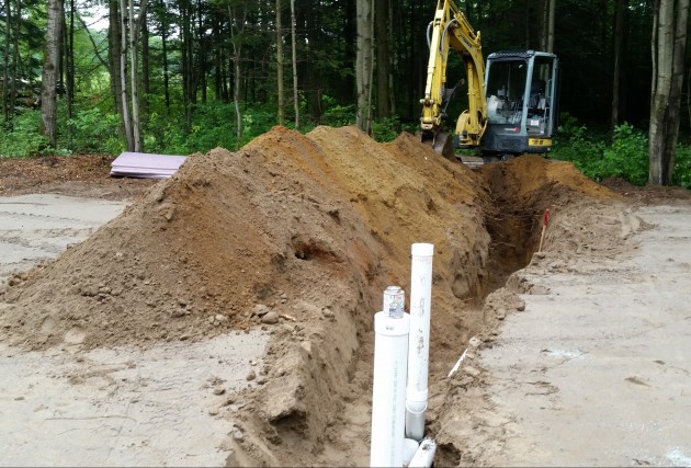 Maison de campagne écoénergétique sur un étage avec garage attaché - McClure Construction