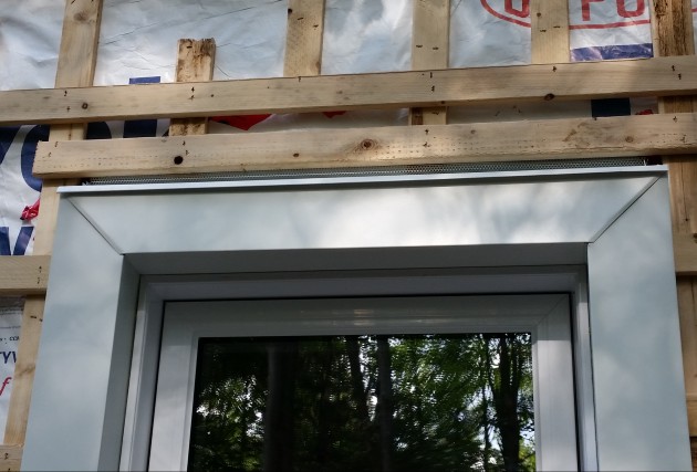 Maison de campagne écoénergétique sur un étage avec garage attaché - McClure Construction