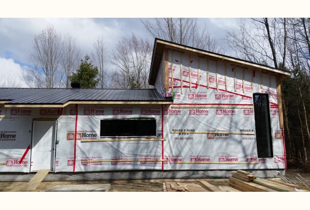 La petite Noire Écoénergétique (maison familiale) - McClure Construction